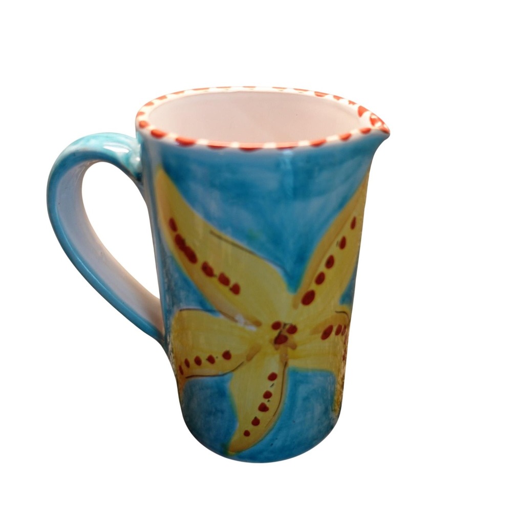 Ceramic tall pitcher with starfish and sea animals in aqua blue color